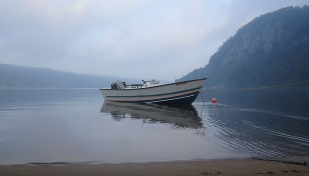 Scenic standard Tolman skiff wooden boat